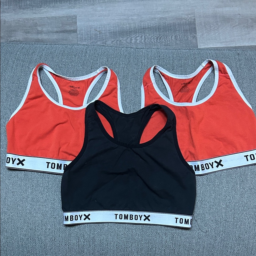 Three Medium Tomboy X Racer Back Sport Bras